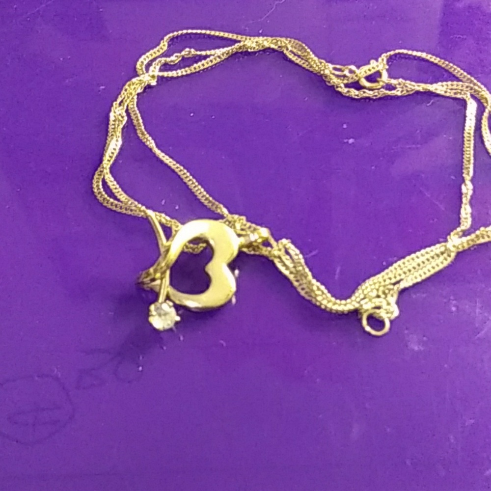 - A DAINTY HEART WITH A REAL DIAMOND.       also gift with purchase